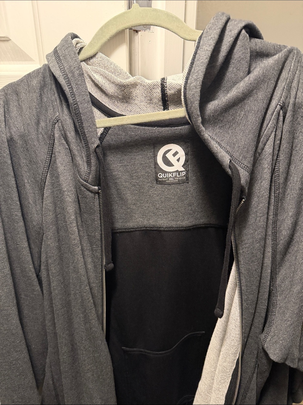 Full Zip Hooded Sweatshirt that flips into a backpack with straps